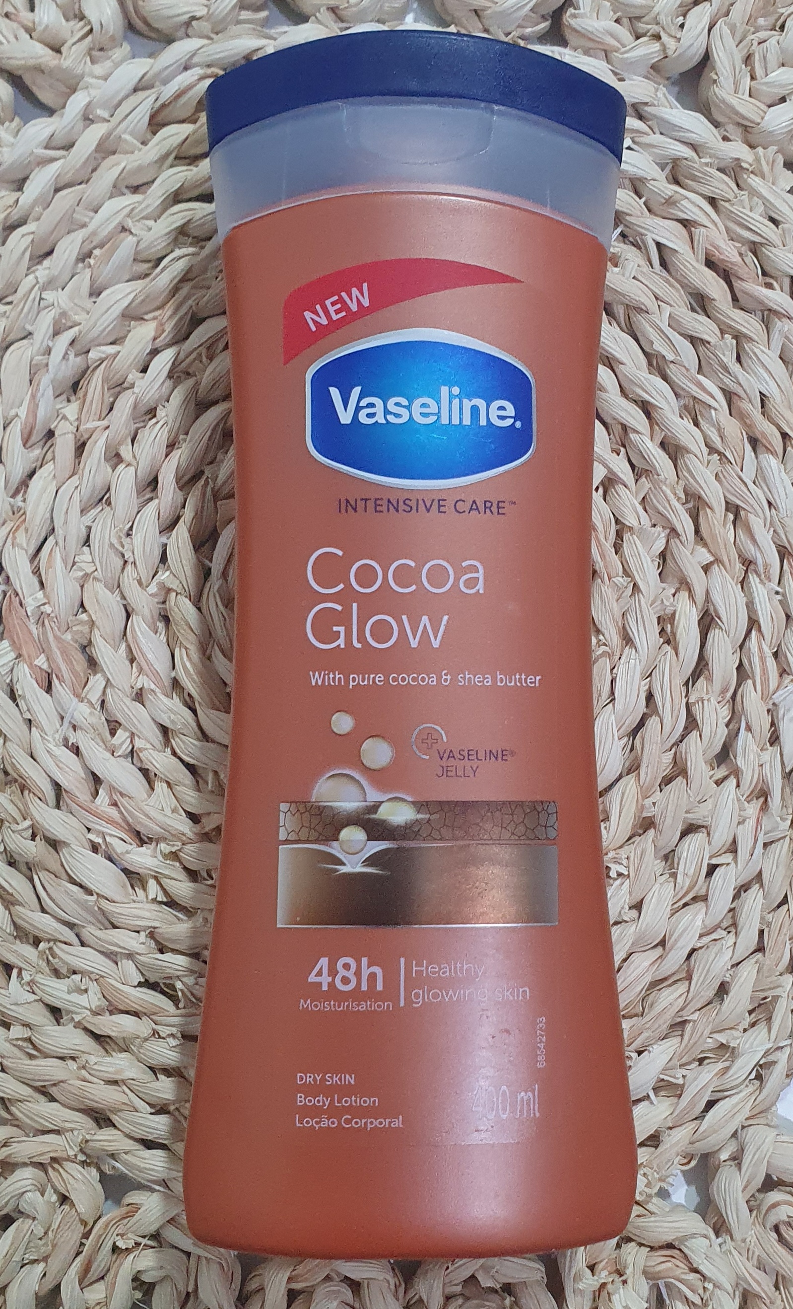 لوسیون بدن وازلین مدل Cocoa Glow حاوی کره کاکائو و شی‌باتر - حجم ۴۰۰ میلی‌لیتر - اورجینال وارداتی