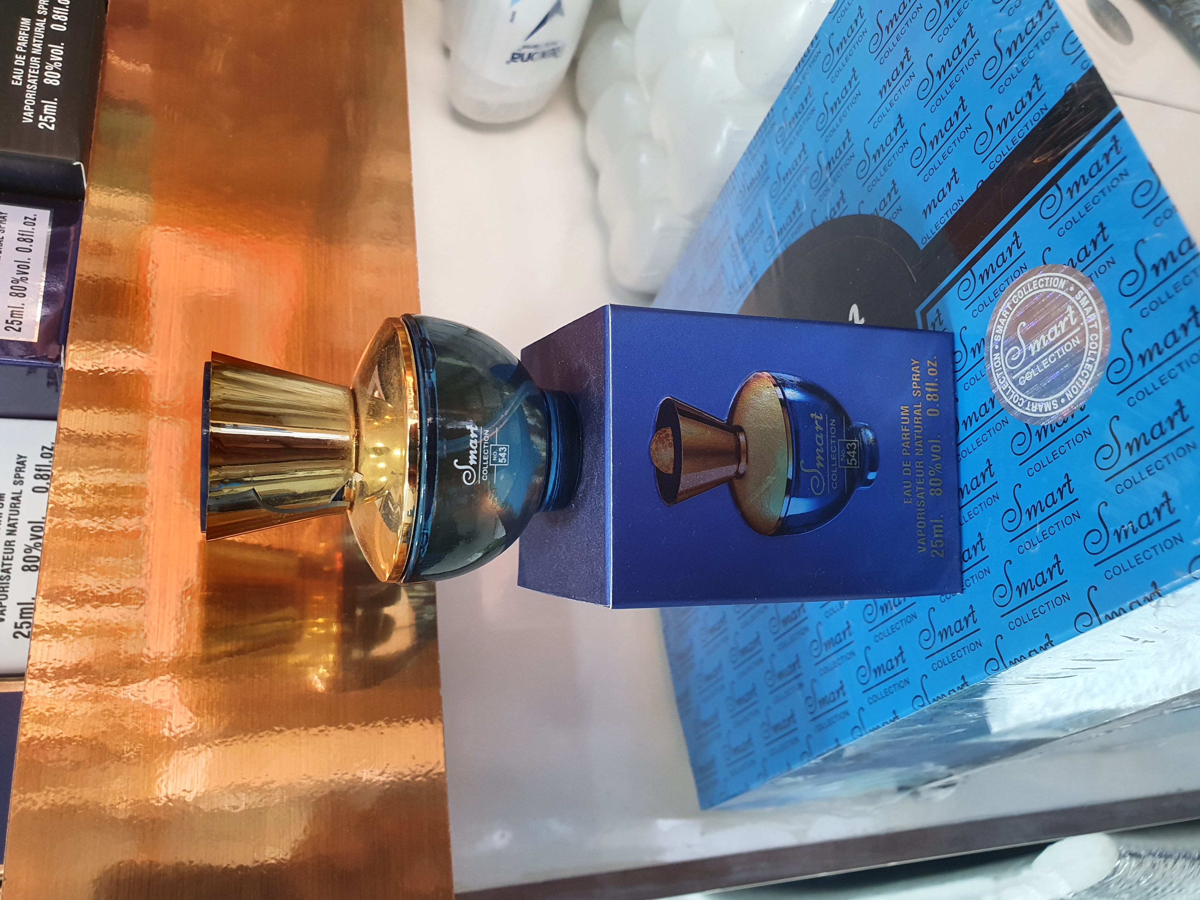 عطر ۲۵ میل اسمارت کالکشن کد ۵۴۳ (رایحه ورساچه دیلن بلو زنانه Versace Dylan Blue Pour Femme) 💙 طلایی و باشکوه